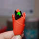 Keep adding petals wherever you want on your rose. Wrapping them using the sticky part of the duct tape.