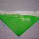 Fold in the other corner to make a point at the top and still continue the sticky strip at the bottom.