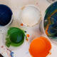 You'll want a good supply of small plastic bathroom-size cups. Pour one paint color per cup.