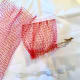 Sew the closed ribbon edge directly towards the center of the base.