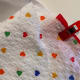 Fold in half lengthwise placing raw edges to the outside and sandwich between base and cover fabrics.