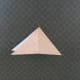 Open triangle and refold down the center at the top tip. Have the fold on the right side.