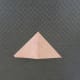 Cut a three inch square in half diagonally. Fold triangle in half at the point.