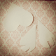 Turn a diecut cardstock heart into a pair of owl wings with a few quick snips!