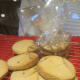 Wrap a few biscuits in florists' cellophane or something similar. Tie with a ribbon and give as a Halloween gift.