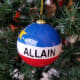 My Allain family ornament is an orb styled after the Acadian flag.