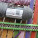 Top view of each peg after one round of wrapping. Always keep slight pressure on the yarn so it doesn't unwind.