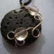 Lava stone with silver wire wrap and pink crystals
