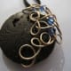 Lava stone with silver wrap and blue crystals
