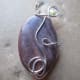 Mahogany marble with silver wire wrap and Swarovski crystal