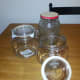 You can use jars from food you have finished or you can buy jars. Pictured here are a pickle jar and two dollar store mason jars.