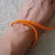 Wrap the paracord around the wrist snuggly