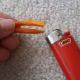 Using a lighter, singe the ends of the rope together to prevent fraying