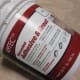 We like to use an adhesive and grout mixture that can be purchased ready to use.