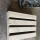 Screw the boards that will create the floor to the back of one of the frames.