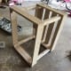 Slide the other 1x4 frame over the top of the 2x2 posts and screw it into place.