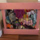 The completed stuffed animal cage holding stuffed animals.