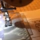 The inner seam is done after the outer seam. Move any pins that need adjusting. Sew close to the inner edge of the blanket trim.