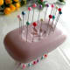 Pins on top and bottom of soap