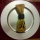Fold and attach napkin ring to keep in place.
