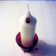 Red crayon piece inside hole