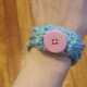 Chain stitch bangle with button.