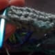 Slipstitch or sew band around chains.