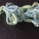 Fasten off both colours and weave in ends.