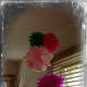 Tissue Paper Flowers Suspended From the Ceiling