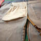 Cut off the front of the jeans.