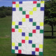 Turn your nine-patch blocks into a simplified Irish chain quilt. Just alternate nine-patch blocks with solid setting blocks cut to the same size.