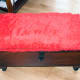 Foam covered with red faux fur.
