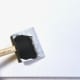 A polyfoam brush is an easy way to apply gesso to a canvas.