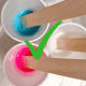 Slowly stirring your paints and pouring medium with a wood craft stick will blend the colors without adding air bubbles.