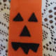 Face glued onto the bookmark.