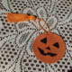Yarn glued to front of the bookmark holding the tassel in place.