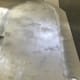 I selected an aluminum-colored spray paint and used two coats. When selecting a paint shade, err on the lighter side. After painting the epitaphs then applying the clearcoat, the color became slightly darker.
