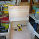 Stay bar fitted to lid, to keep it in place when open