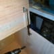 Stay bar holding lid open