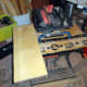 Scrap wood to be cut into strips for securely fixing wheels to underside of base