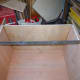 Back section of cabinet top fixed in place with dowels and glue