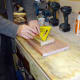 Marking up a decking off-cut to make battens for creating a housing for routing slots in the meranti planks