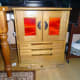 Completed sewing machine cabinet in Conservatory with doors and lid closed