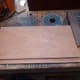 The two temporary spacers cut to size in preparation for fixing the shelving.