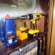 Using the shorter spacer to help fit the shelve support at the correct height.