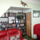 Both new shelves fitted in place, in front of the mirrored picture.