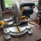 Cutting the beading to length for using as shelf supports.