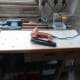 Edging glued and nailed to edge of plywood shelf.