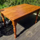 The pine table we replaced with the renovated oak table as a sewing table.