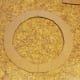 Cut a smaller circle in the center leaving 1 1/2 to 2 inches of cardboard around your circle.